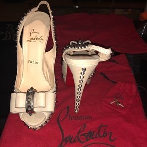 Christina Louboutin Tan spike peep toe heels